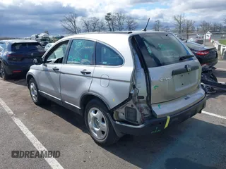 2008 Honda CR-V LX with VIN JHLRE38338C005828, listed as a IAAI auction lot 42042857 with 104,181 mi miles and . Bid and sale history available at carsss.com. Image 3.