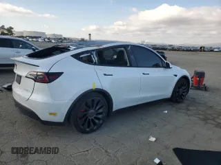 2022 Tesla Model Y Performance with VIN 7SAYGDEF1NF342071, listed as a Copart auction lot 43084905 with 30,534 mi miles and Salvage Title. Bid and sale history available at DreamBid. Image 3.