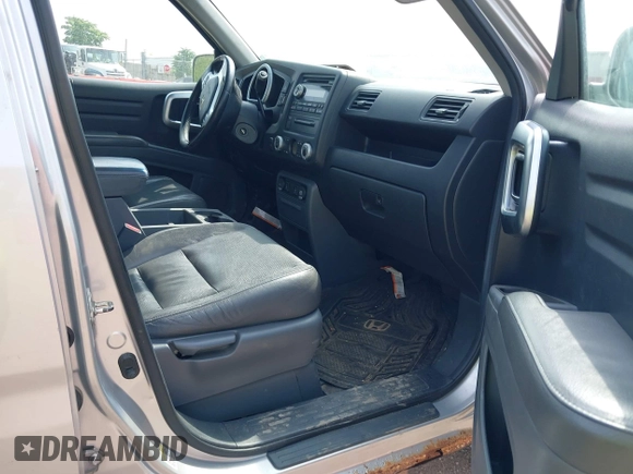 2007 Honda Ridgeline RTL z VIN 2HJYK16517H530890, wystawiony jako IAAI lot #42521976 z przebiegiem 285 222 mil mil oraz . Historia ofert i sprzedaży dostępna na DreamBid. Obrazek 5.