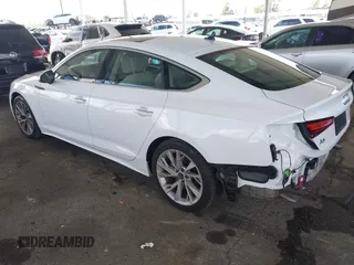 2023 Audi A5 Sportback Premium z VIN WAUABCF54PA052249, wystawiony jako IAAI lot #41916508 z przebiegiem 19 062 mil mil oraz . Historia ofert i sprzedaży dostępna na DreamBid. Obrazek 3.