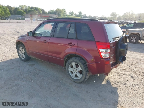 2006 Suzuki Grand Vitara Luxury with VIN JS3TD947564104838, listed as a IAAI auction lot 42082783 with 122,912 mi miles. Bid and sale history available at carsss.com. Image 3.