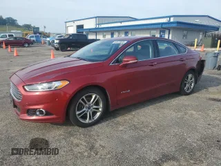 2015 Ford Fusion Titanium Hybrid z VIN 3FA6P0RU6FR116720, wystawiony jako Copart lot #63573695 z przebiegiem 305 961 mil mil oraz Czysty tytuł • Clean title. Historia ofert i sprzedaży dostępna na DreamBid. Obrazek 1.