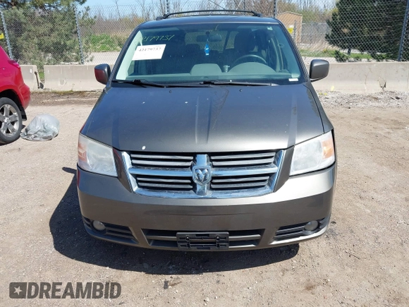 2010 Dodge Grand Caravan SXT with VIN 2D4RN5D1XAR293862, listed as a IAAI auction lot 42179737 with 324,144 mi miles and . Bid and sale history available at DreamBid. Image 12.