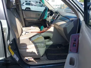 2004 Toyota Highlander with VIN JTEEP21A340048257, listed as a IAAI auction lot 41940474 with 255,423 mi miles. Bid and sale history available at carsss.com. Image 5.