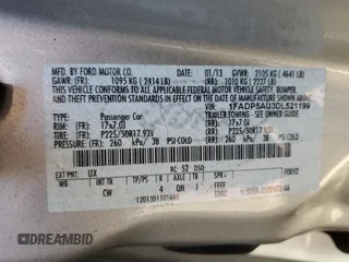 2013 Ford C-Max SE z VIN 1FADP5AU3DL521199, wystawiony jako Copart lot #55250685 z przebiegiem 87 362 mil mil oraz Szkoda całkowita • Salvage title. Historia ofert i sprzedaży dostępna na DreamBid. Obrazek 13.
