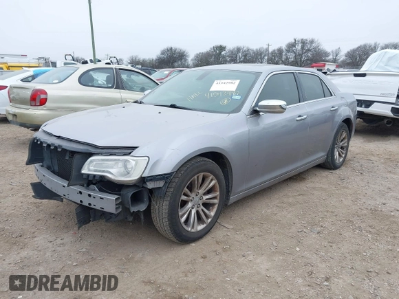 2015 Chrysler 300 C with VIN 2C3CCAEG0FH779540, listed as a IAAI auction lot 41542982 with 211,348 mi miles and . Bid and sale history available at carsss.com. Image 2.