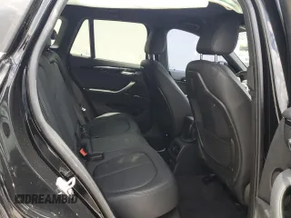 2016 BMW X1 xDrive28i z VIN WBXHT3C34G5E54952, wystawiony jako Copart lot #60713485 z przebiegiem 69 395 mil mil oraz Szkoda całkowita • Salvage title. Historia ofert i sprzedaży dostępna na DreamBid. Obrazek 11.