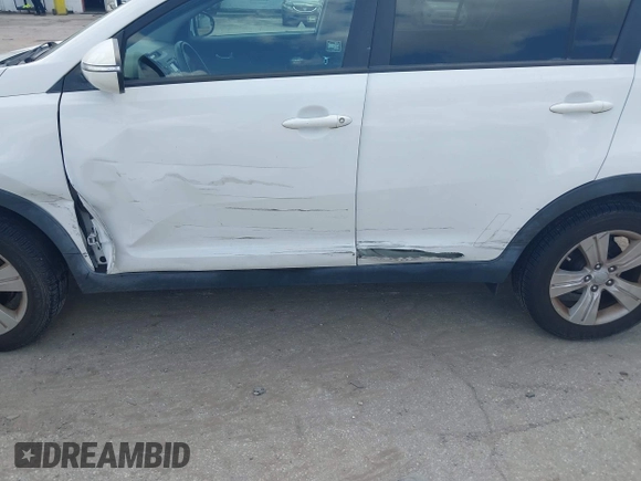 2012 Kia Sportage LX with VIN KNDPB3A2XC7237360, listed as a IAAI auction lot 42478625 with 122,824 mi miles and . Bid and sale history available at DreamBid. Image 6.