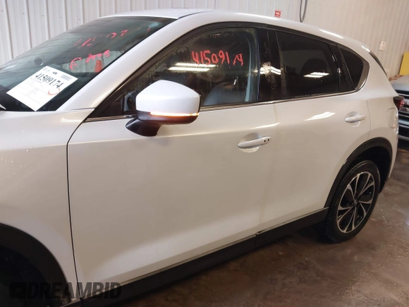 2023 Mazda CX-5 2.5 S Premium Plus Package with VIN JM3KFBEM5P0258952, listed as a IAAI auction lot 41509174 with 24,712 mi miles. Bid and sale history available at carsss.com. Image 14.