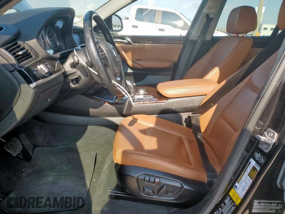 2015 BMW X4 xDrive28i with VIN 5UXXW3C52F0M87621, listed as a Copart auction lot 59176505 with 163,727 mi miles and Salvage title. Bid and sale history available at DreamBid. Image 7.