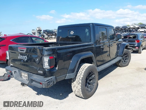 2020 Jeep Gladiator Overland with VIN 1C6HJTFG2LL149056, listed as a IAAI auction lot 41524168 with 113,503 mi miles and . Bid and sale history available at DreamBid. Image 4.