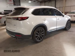 2017 Mazda CX-9 Grand Touring with VIN JM3TCADY5H0132572, listed as a IAAI auction lot 41421008 with 66,656 mi miles and . Bid and sale history available at DreamBid. Image 4.