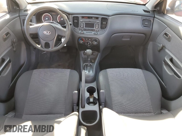 2010 Kia Rio LX with VIN KNADH4A32A6678111, listed as a Copart auction lot 52632895 with 98,392 mi miles and Salvage Title. Bid and sale history available at carsss.com. Image 8.