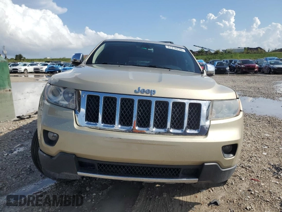 2011 Jeep Grand Cherokee Overland with VIN 1J4RS6GG4BC710103, listed as a Copart auction lot 51316235 with 179,393 mi miles and Salvage Title. Bid and sale history available at DreamBid. Image 5.