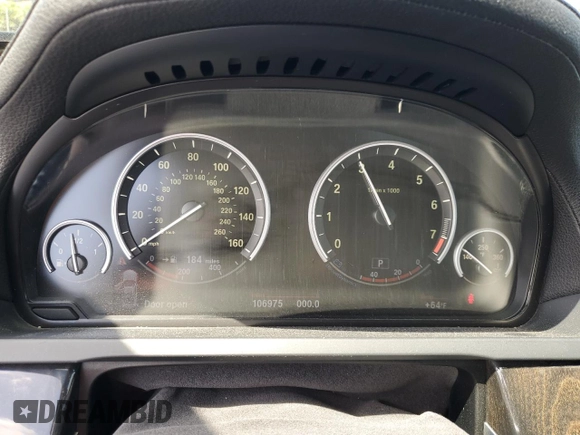 2013 BMW 7 Series 740i with VIN WBAYA6C58DC994974, listed as a Copart auction lot 55534645 with 106,975 mi miles and Salvage title. Bid and sale history available at DreamBid. Image 9.