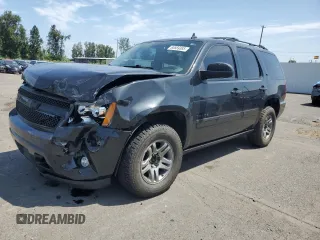 2011 Chevrolet Tahoe LTZ with VIN 1GNSKCE08BR234602, listed as a Copart auction lot 60669385 with 173,752 mi miles and Salvage title. Bid and sale history available at DreamBid. Image 1.