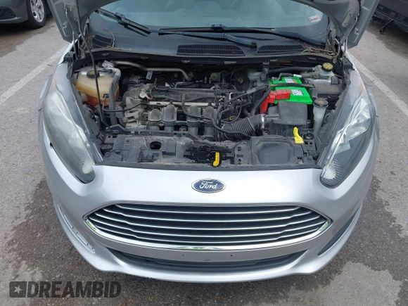 2017 Ford Fiesta S z VIN 3FADP4AJ1HM104006, wystawiony jako IAAI lot #41943413 z przebiegiem 111 873 mil mil oraz . Historia ofert i sprzedaży dostępna na DreamBid. Obrazek 10.