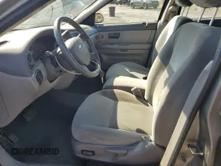 2004 Ford Taurus SE with VIN 1FAFP58S44A108250, listed as a Copart auction lot 58520615 with 119,575 mi miles and Salvage title. Bid and sale history available at DreamBid. Image 7.