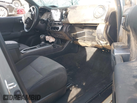 2022 Toyota Tacoma SR with VIN 3TYCZ5AN2NT096491, listed as a IAAI auction lot 42093897 with 47,041 mi miles and . Bid and sale history available at DreamBid. Image 5.
