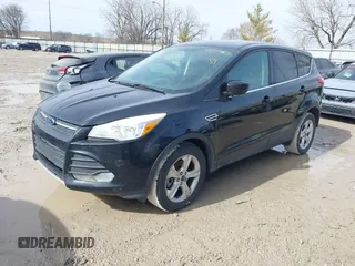 2015 Ford Escape SE with VIN 1FMCU9GX8FUB65137, listed as a IAAI auction lot 41657516 with 145,944 mi miles. Bid and sale history available at carsss.com. Image 2.