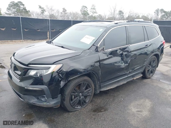 2021 Honda Pilot Special Edition with VIN 5FNYF5H24MB032073, listed as a IAAI auction lot 41469979 with 94,447 mi miles. Bid and sale history available at carsss.com. Image 2.