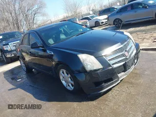2009 Cadillac CTS AWD w/1SA with VIN 1G6DH577290166448, listed as a IAAI auction lot 41751610 with 158,378 mi miles. Bid and sale history available at carsss.com. Image 1.
