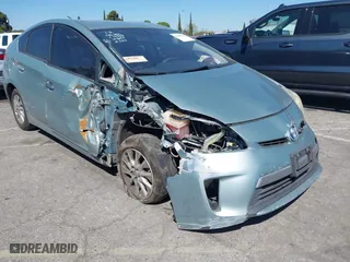 2014 Toyota Prius Plug-In with VIN JTDKN3DP5E3058694, listed as a IAAI auction lot 41840228 with 142,387 mi miles. Bid and sale history available at carsss.com. Image 1.