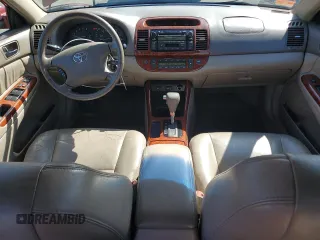 2004 Toyota Camry LE with VIN 4T1BE30KX4U297754, listed as a Copart auction lot 50795425 with 184,152 mi miles and Salvage Title. Bid and sale history available at DreamBid. Image 8.