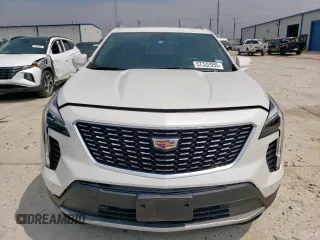 2023 Cadillac XT4 FWD Premium Luxury with VIN 1GYFZCR42PF110122, listed as a Copart auction lot 57332955 with 11,427 mi miles and Salvage title. Bid and sale history available at DreamBid. Image 5.