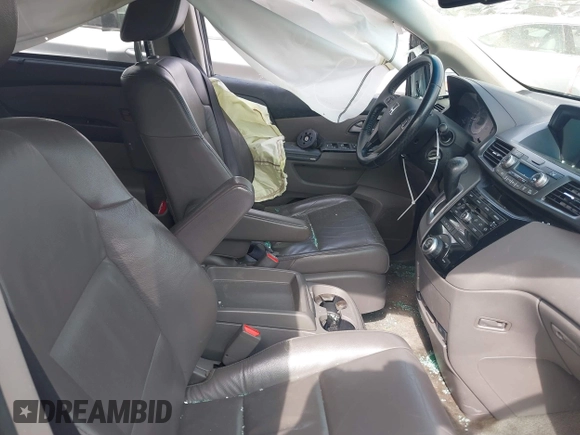 2012 Honda Odyssey EX-L with VIN 5FNRL5H66CB069916, listed as a IAAI auction lot 41935248 with 230,204 mi miles and . Bid and sale history available at carsss.com. Image 5.