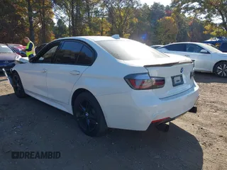 2018 BMW 3 Series 330i xDrive with VIN WBA8D9G55JNU67347, listed as a IAAI auction lot 40597140 with 68,557 mi miles. Bid and sale history available at carsss.com. Image 3.