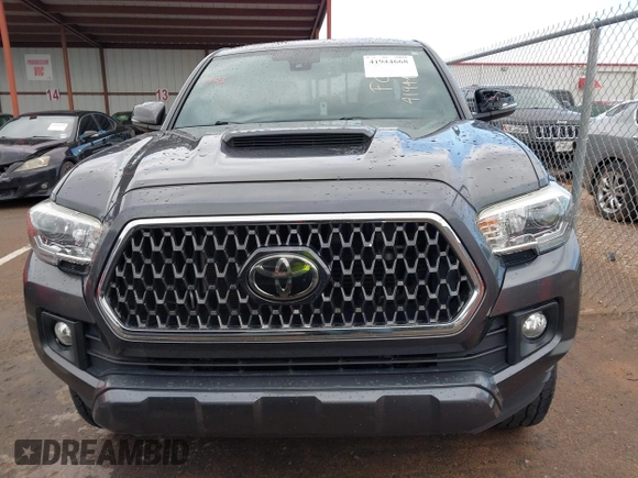 2018 Toyota Tacoma SR5 with VIN 3TMAZ5CN0JM061233, listed as a IAAI auction lot 41944668 with 94,314 mi miles and . Bid and sale history available at DreamBid. Image 12.