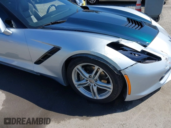 2017 Chevrolet Corvette 1LT z VIN 1G1YA2D71H5103681, wystawiony jako IAAI lot #42302548 z przebiegiem 69 557 mil mil oraz . Historia ofert i sprzedaży dostępna na DreamBid. Obrazek 6.