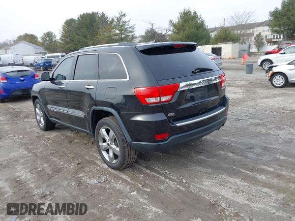 2013 Jeep Grand Cherokee Overland with VIN 1C4RJECG5DC621149, listed as a IAAI auction lot 41255140 with 157,355 mi miles. Bid and sale history available at carsss.com. Image 3.