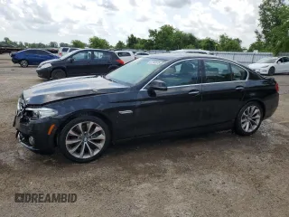 2014 BMW 5 Series 528i xDrive with VIN WBA5A7C55ED219780, listed as a Copart auction lot 61792075 with 210,405 mi miles and Salvage title. Bid and sale history available at DreamBid. Image 1.