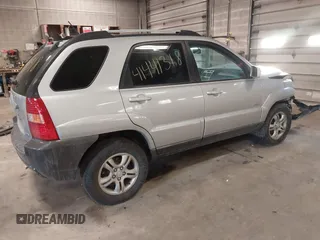 2005 Kia Sportage LX with VIN KNDJE723X57071792, listed as a IAAI auction lot 41441318 with 249,652 mi miles and . Bid and sale history available at carsss.com. Image 4.