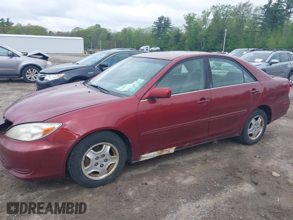 2003 Toyota Camry LE z VIN 4T1BF32K63U050174, wystawiony jako IAAI lot #42260843 z przebiegiem 210 486 mil mil oraz . Historia ofert i sprzedaży dostępna na DreamBid. Obrazek 13.