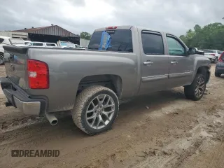 2013 Chevrolet Silverado 1500 LT with VIN 3GCPCSE07DG265705, listed as a Copart auction lot 51494245 with 127,731 mi miles and Salvage Title. Bid and sale history available at DreamBid. Image 3.
