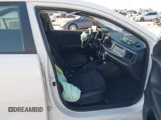 2023 Kia Rio LX with VIN 3KPA24AD9PE598789, listed as a IAAI auction lot 42019297 with 16,232 mi miles. Bid and sale history available at carsss.com. Image 5.
