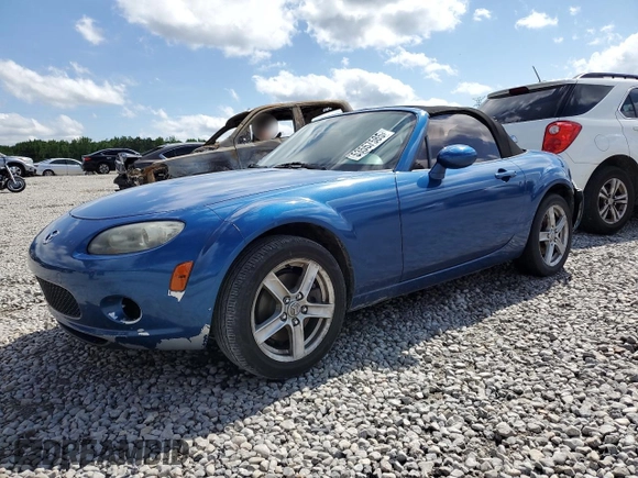 2006 Mazda MX-5 Miata Sport z VIN JM1NC25F760122353, wystawiony jako Copart lot #53557585 z przebiegiem 150 409 mil mil oraz Szkoda całkowita • Salvage title. Historia ofert i sprzedaży dostępna na DreamBid. Obrazek 1.
