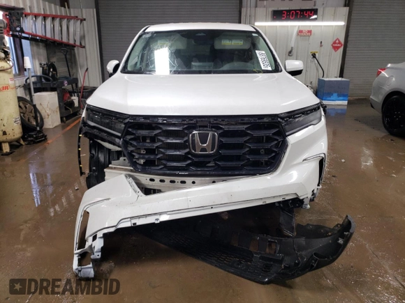 2023 Honda Pilot EX-L z VIN 5FNYG1H56PB043273, wystawiony jako Copart lot #88769535 z przebiegiem 19 033 mil mil oraz Szkoda całkowita • Salvage title. Historia ofert i sprzedaży dostępna na DreamBid. Obrazek 5.