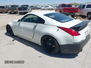 2004 Nissan 350Z Touring with VIN JN1AZ34E34T060024, listed as a IAAI auction lot 42327915 with 96,197 mi miles and . Bid and sale history available at DreamBid. Image 3.