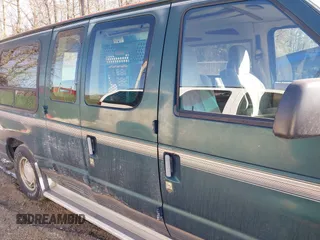 1999 Ford Econoline Cargo with VIN 1FDRE14W3XHB36482, listed as a IAAI auction lot 41393346 with 130,669 mi miles. Bid and sale history available at carsss.com. Image 13.