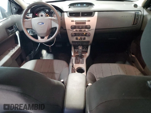 2008 Ford Focus SE z VIN 1FAHP35N98W121449, wystawiony jako Copart lot #60323735 z przebiegiem 83 990 mil mil oraz Czysty tytuł • Clean title. Historia ofert i sprzedaży dostępna na DreamBid. Obrazek 8.