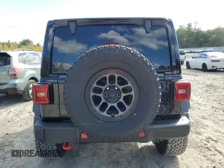 2023 Jeep Wrangler Rubicon with VIN 1C4HJXFN4PW636133, listed as a Copart auction lot 75499614 with 13,252 mi miles and Salvage title. Bid and sale history available at DreamBid. Image 6.