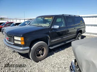 1999 GMC Suburban with VIN 3GKGK26J7XG520047, listed as a Copart auction lot 65038305 with 122,877 mi miles and Clean title. Bid and sale history available at DreamBid. Image 1.