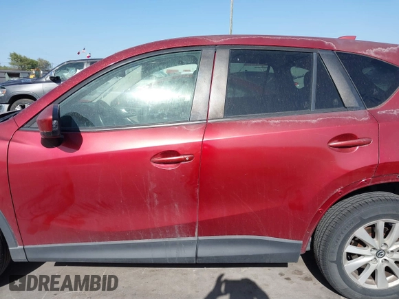 2013 Mazda CX-5 Touring with VIN JM3KE2CE9D0117750, listed as a IAAI auction lot 41858518 with 90,610 mi miles and . Bid and sale history available at carsss.com. Image 15.