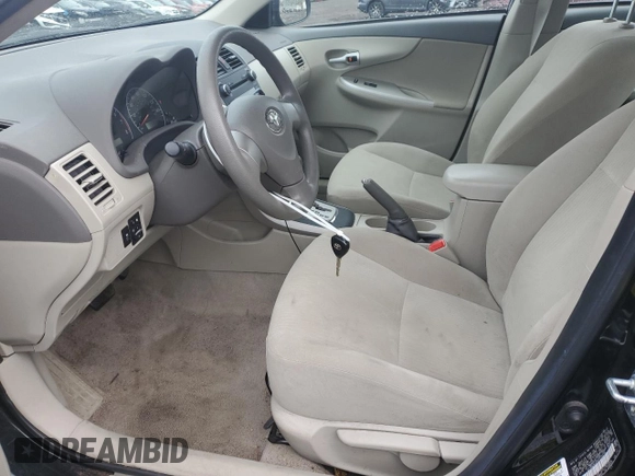 2010 Toyota Corolla with VIN 2T1BU4EE2AC528459, listed as a Copart auction lot 52797495 with 25,809 mi miles and Salvage Title. Bid and sale history available at carsss.com. Image 7.