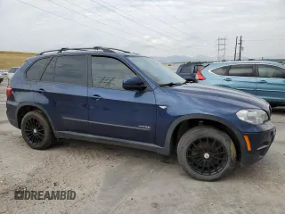 2012 BMW X5 35i с VIN 5UXZV4C5XCL749123, выставлен на аукционе Copart как лот 65259585 с пробегом 124 193 миль миль и Чистый • Clean title. История ставок и продаж доступна на DreamBid. Изображение 4.
