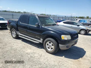 2001 Ford Explorer Sport Trac with VIN 1FMZU77E21UC32983, listed as a Copart auction lot 62192365 with 179,611 mi miles and Salvage title. Bid and sale history available at DreamBid. Image 4.